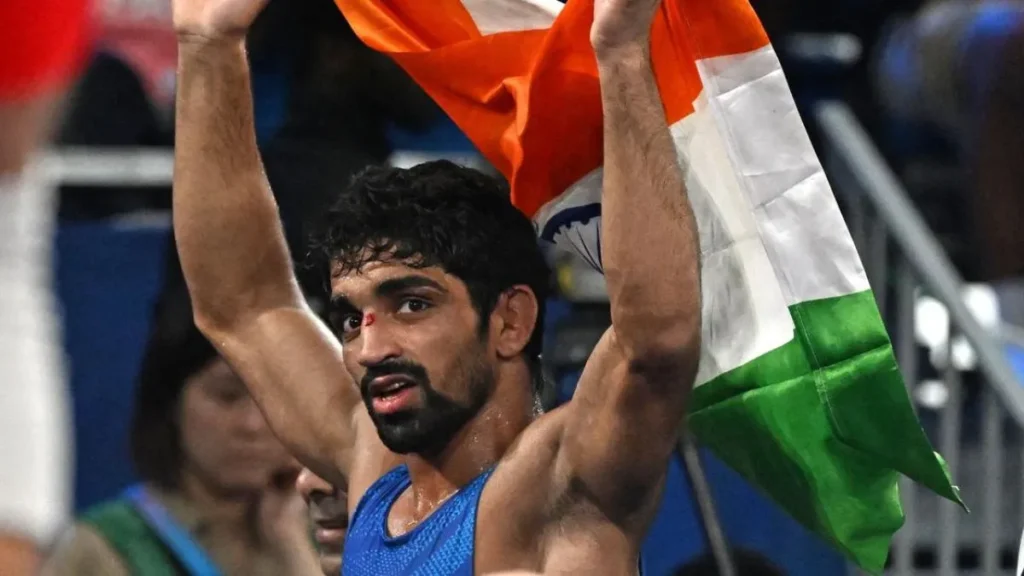 Indian flag, blue sando , cut on the nose, sweat , stadium