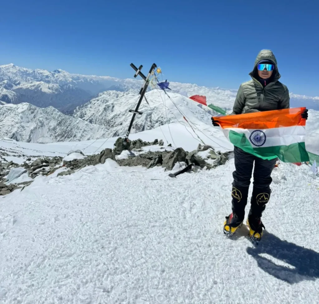 Mount everest, indian flag , tricolor , ice , snow, grey jacket , puffer jacket , ice tent , snow tent , reena bhatti